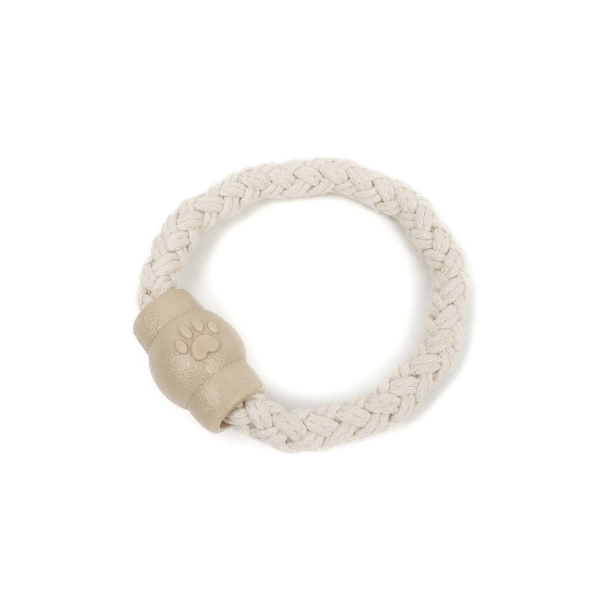Beige braided dog toy with a paw print on a white background