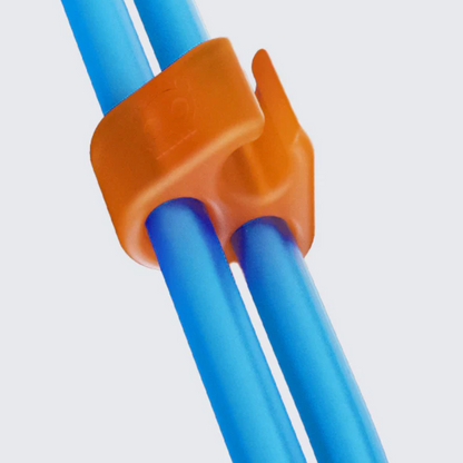 Orange clip of the sapphire hands-free lead on a light gray background