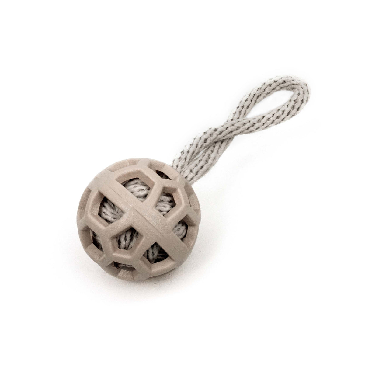 Beige ball with rope on a white background