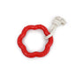 Red dog toy with a white rope on a white background