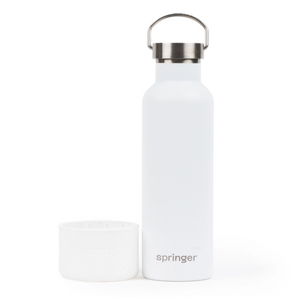 White "Dog & Me" Reusable Insulated Bottle on a white background. The bottle features a silicone cup that can be used as a dog water bowl and has a brushed chrome top with handle.