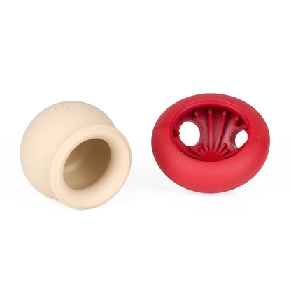 Beige and red rubber mushroom toy on a white background