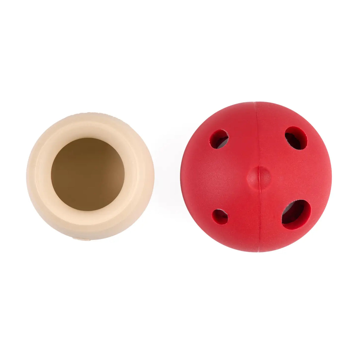Beige and red mushroom toy on a white background