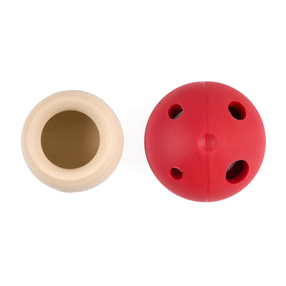 Beige and red mushroom toy on a white background