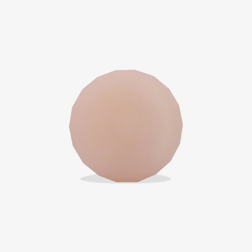 Round, pink-coloured airtag holder on a white background