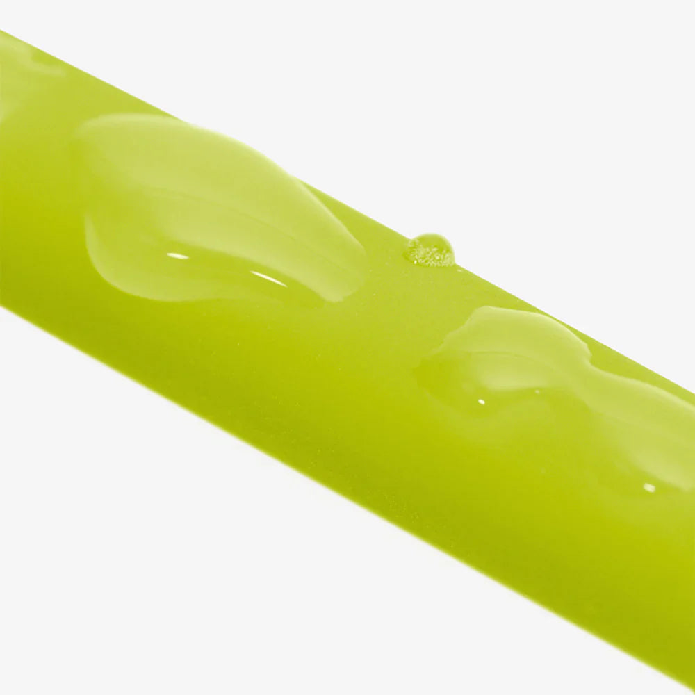 Close-up of rubber of hands-free leash with water drops on a white background