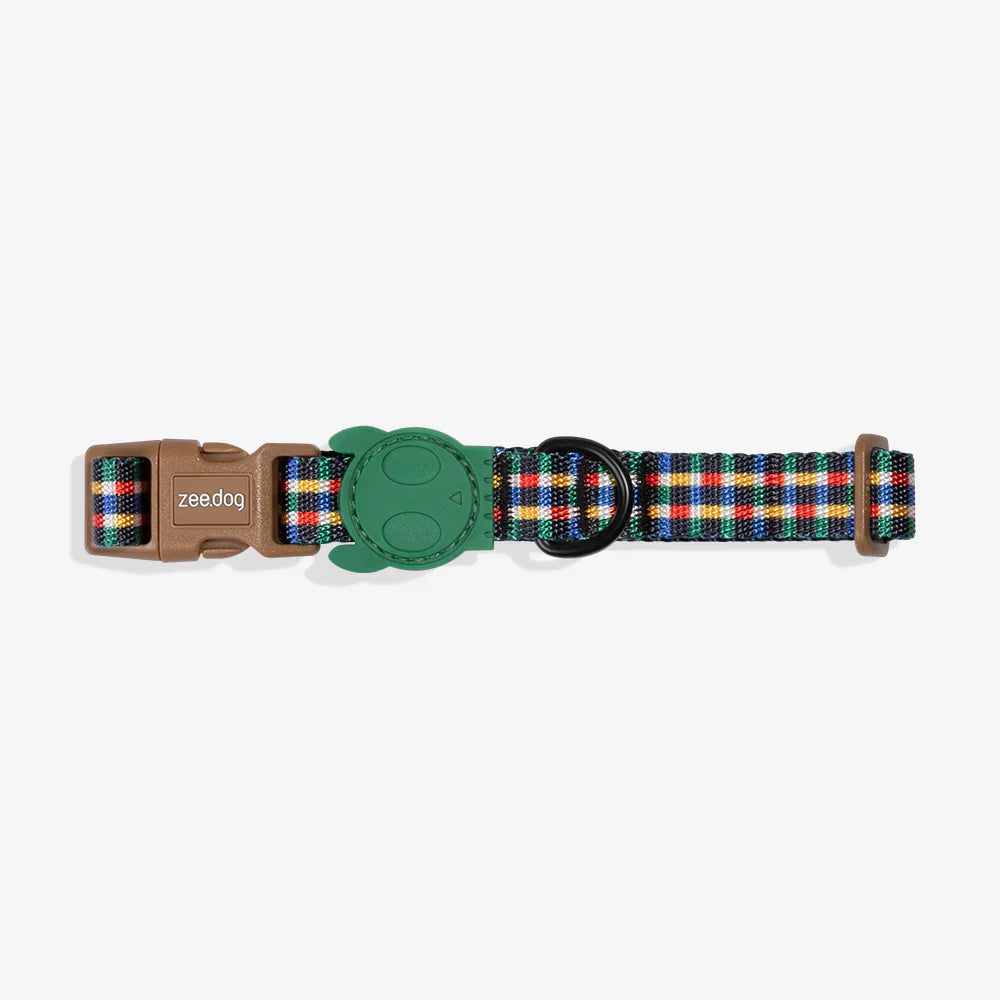 Dog collar with colorful plaid pattern and green buckle on a white background